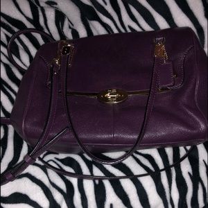 Used authentic purple Coach handbag